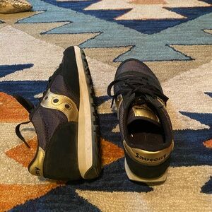 Saucony Jazz black and gold sneakers